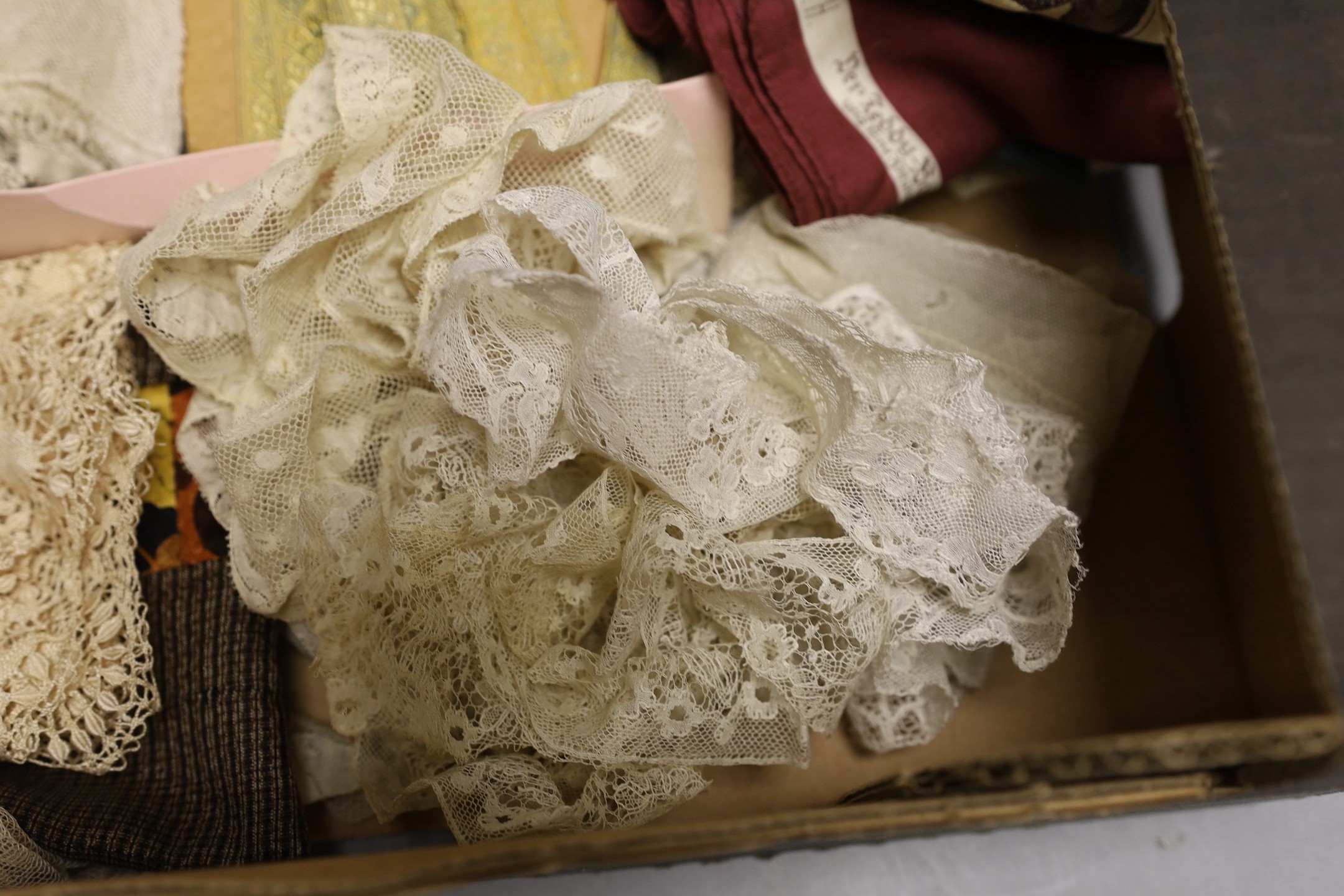 An unusual Steiff commemorative scarf, a collection of Victorian and later ribbons and a length of early 19th century fine bobbin lace, silk Maltese lace and silk mittens, etc.